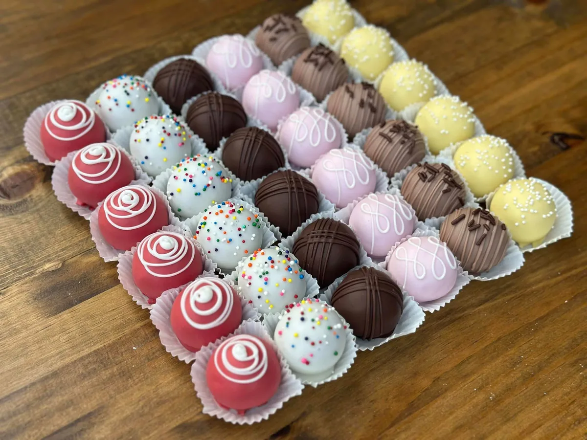A colorful assortment of decorated cake balls